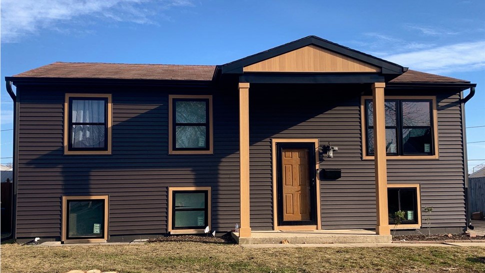 Attic Insulation, Doors, Gutters, Roofing, Siding, Soffit and Fascia, Windows Project in Romeoville, IL by Stan's Roofing & Siding