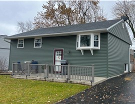 Gutters, Metal Roofing, Soffit and Fascia Project in Romeoville, IL by Stan's Roofing & Siding