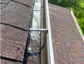 Gutters Project in Naperville, IL by Stan's Roofing & Siding
