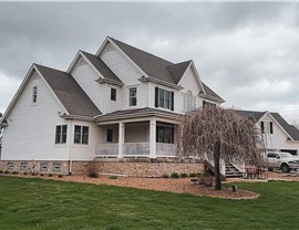 Decks, Gutters, Metal Roofing, Siding, Soffit and Fascia Project in Manteno, IL by Stan's Roofing & Siding