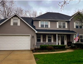 Gutters, Roofing Project in Oswego, IL by Stan's Roofing & Siding