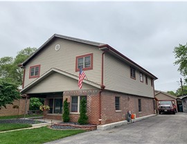 Gutters, Siding, Soffit and Fascia Project in Merrionette Park, IL by Stan's Roofing & Siding