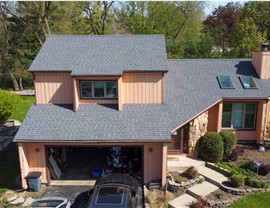 Gutters, Siding, Soffit and Fascia Project in Woodridge, IL by Stan's Roofing & Siding