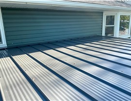 Gutters, Metal Roofing, Soffit and Fascia Project in Romeoville, IL by Stan's Roofing & Siding