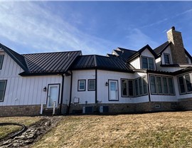 Decks, Gutters, Metal Roofing, Siding, Soffit and Fascia Project in Manteno, IL by Stan's Roofing & Siding