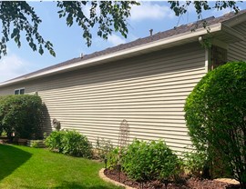 Gutters Project in Romeoville, IL by Stan's Roofing & Siding