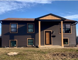 Attic Insulation, Doors, Gutters, Roofing, Siding, Soffit and Fascia, Windows Project in Romeoville, IL by Stan's Roofing & Siding