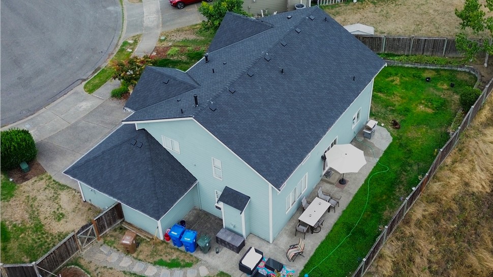 Tacoma WA roof replacement backyard view CertainTeed Presidential charcoal shingles