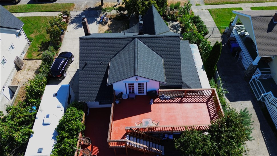 Tacoma WA roof replacement top view asphalt shingles and structure integration