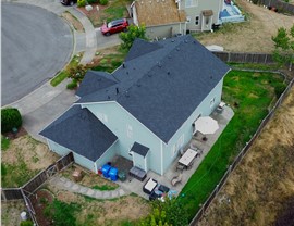 Tacoma WA roof replacement backyard view CertainTeed Presidential charcoal shingles