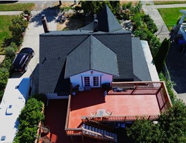 Tacoma WA roof replacement top view asphalt shingles and structure integration