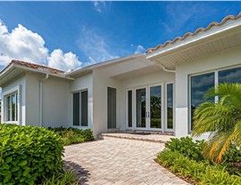 Houston-area home with impact-resistant replacement windows and glass doors