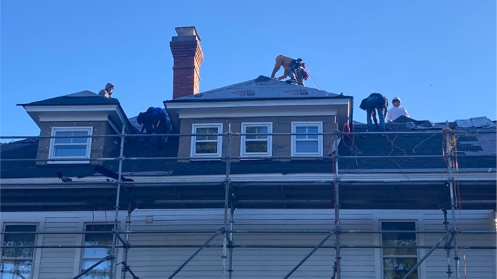 Gutters, Roofing, Skylights Project in Hampton, VA by The Roofing Company