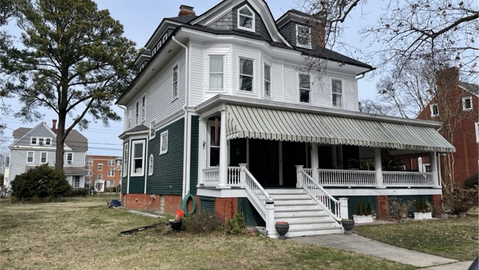 Gutters, Roofing, Skylights Project in Hampton, VA by The Roofing Company