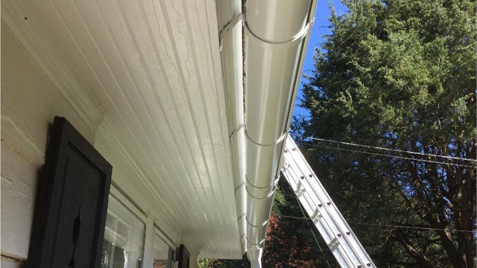 Gutters, Roofing, Skylights Project in Norfolk, VA by The Roofing Company