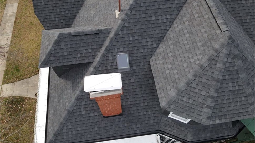 Gutters, Roofing, Skylights Project in Hampton, VA by The Roofing Company