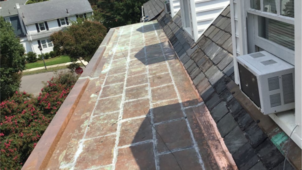 Gutters, Roofing Project in Norfolk, VA by The Roofing Company