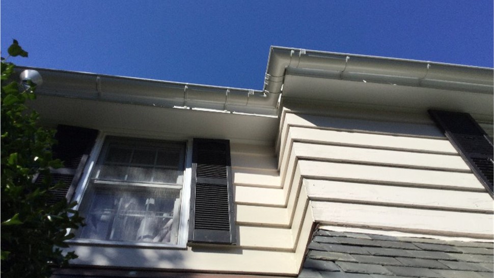 Gutters, Roofing, Skylights Project in Norfolk, VA by The Roofing Company