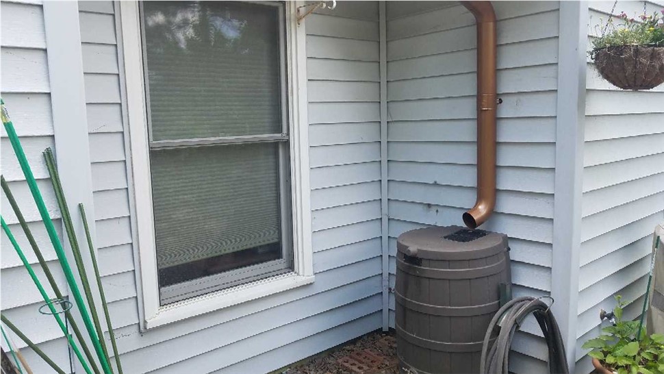 Gutters Project in Virginia Beach, VA by The Roofing Company