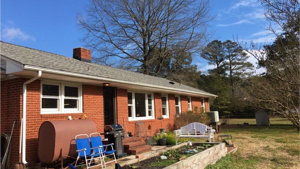 Gutters, Roofing Project in Hayes, VA by The Roofing Company
