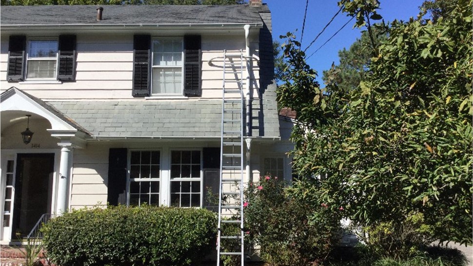 Gutters, Roofing, Skylights Project in Norfolk, VA by The Roofing Company