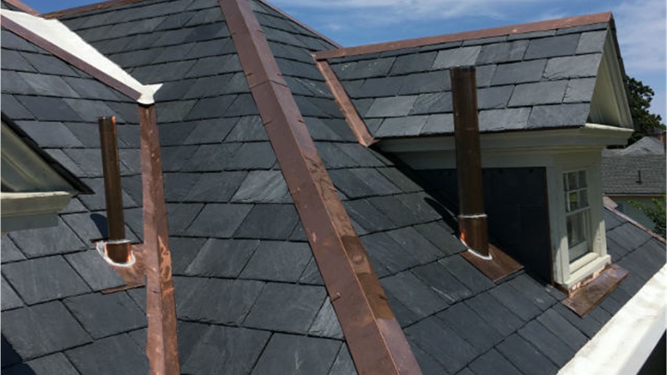 Gutters, Roofing Project in Hampton, VA by The Roofing Company