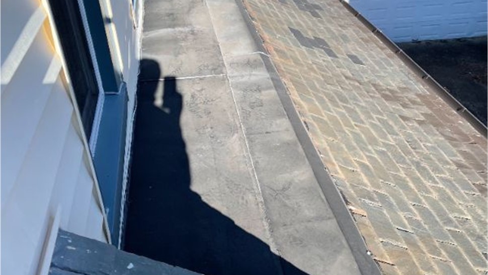 Gutters, Roofing Project in Norfolk, VA by The Roofing Company