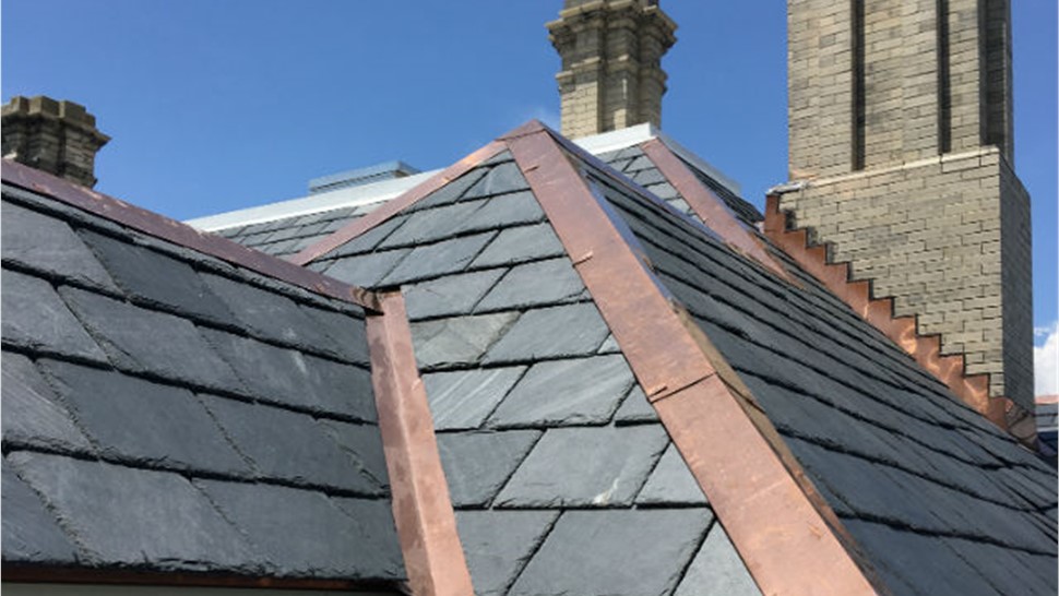 Gutters, Roofing Project in Hampton, VA by The Roofing Company