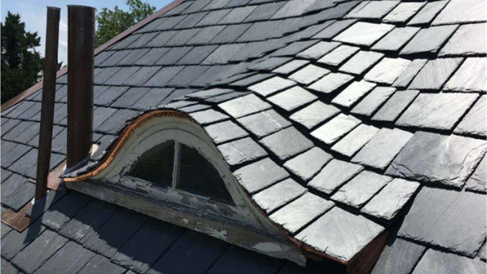 Gutters, Roofing Project in Hampton, VA by The Roofing Company