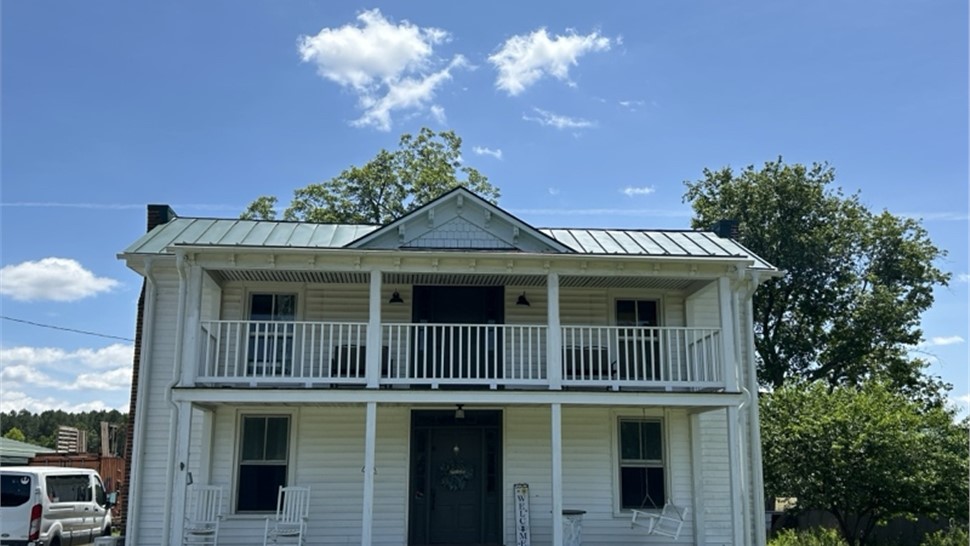 Gutters, Roofing Project in Ivor, VA by The Roofing Company