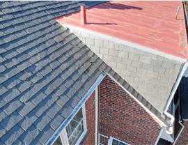 Gutters, Roofing Project in Norfolk, VA by The Roofing Company