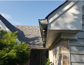 Gutters Project in Virginia Beach, VA by The Roofing Company