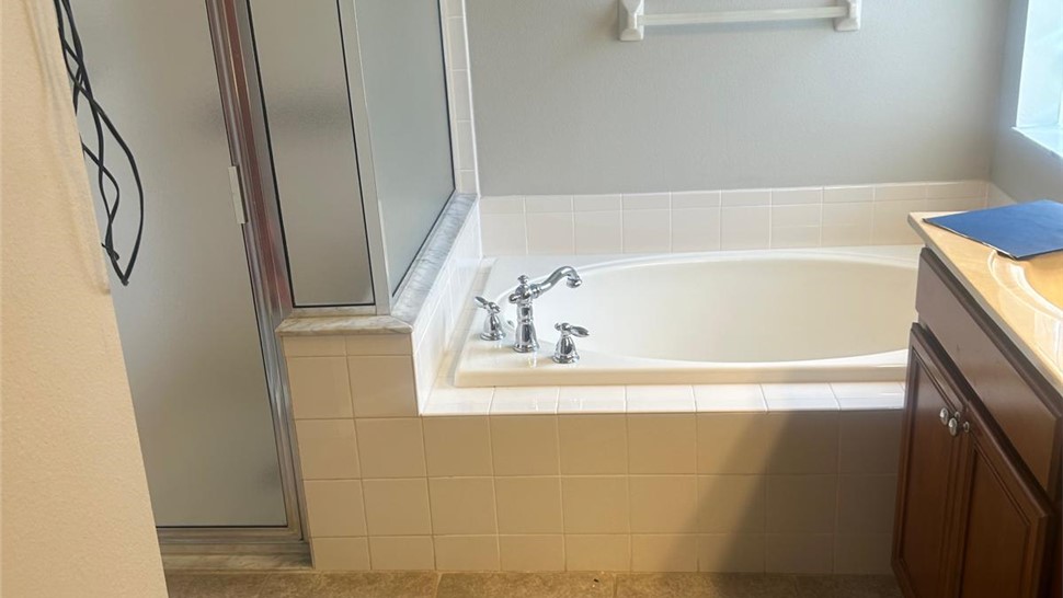 Bathroom Conversions Project in Land O Lakes, Florida by Top Notch Remodelers