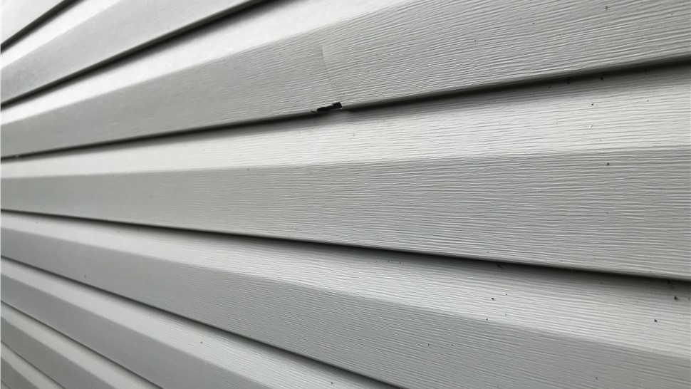 Storm Damage- Siding Storm Damage Photo 1