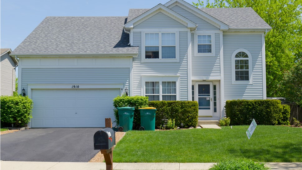 Impeccably installed roof showcasing Owens Corner Estate Gray Shingles by TTLC Inc