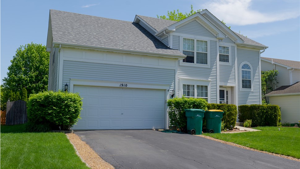 Roof with Owens Corner Estate Gray Shingles installed by TTLC Inc.