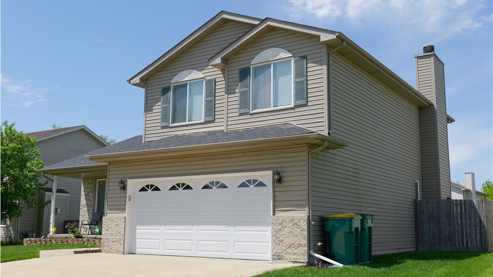 Roof with Owens Corneronyx Black Shingles by TTLC Inc. in Joliet, IL