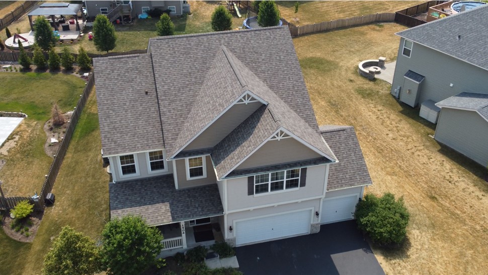 Unveiling Extraordinary House Roofing in Joliet, IL: TTLC Inc. Showcases Owens Corning Driftwood Shingles for Stunning Aerial View