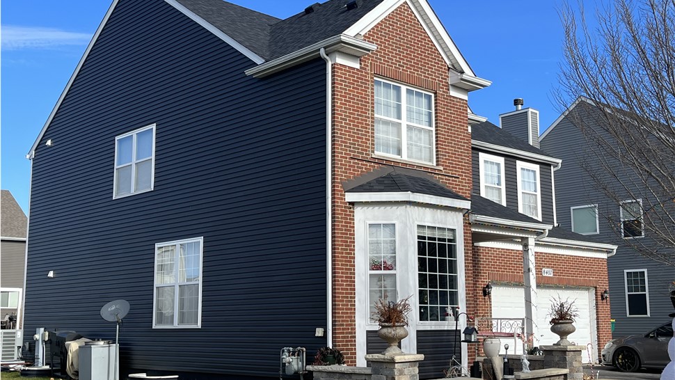 Woodale, Bloomingdale, Grayslake, Joliet, Plainfield, satisfied customer, seamless gutters, siding hail damage, siding repair, roofing repair, seamless gutter systems, affordable, wind damage.