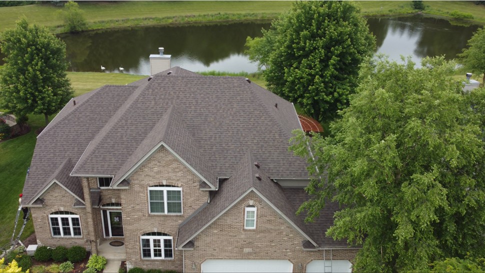 Stunning Teak Color Roof Transformation by TTLC in Yorkville, IL - Elevating Aesthetics and Protection