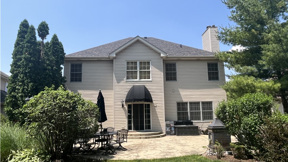 Experience the Captivating Front House View: Black Sable Shingle Roof by TTLC, Inc. in Shorewood, IL, Showcasing Timeless Beauty and Craftsmanship with Premium Owens Corning Materials.