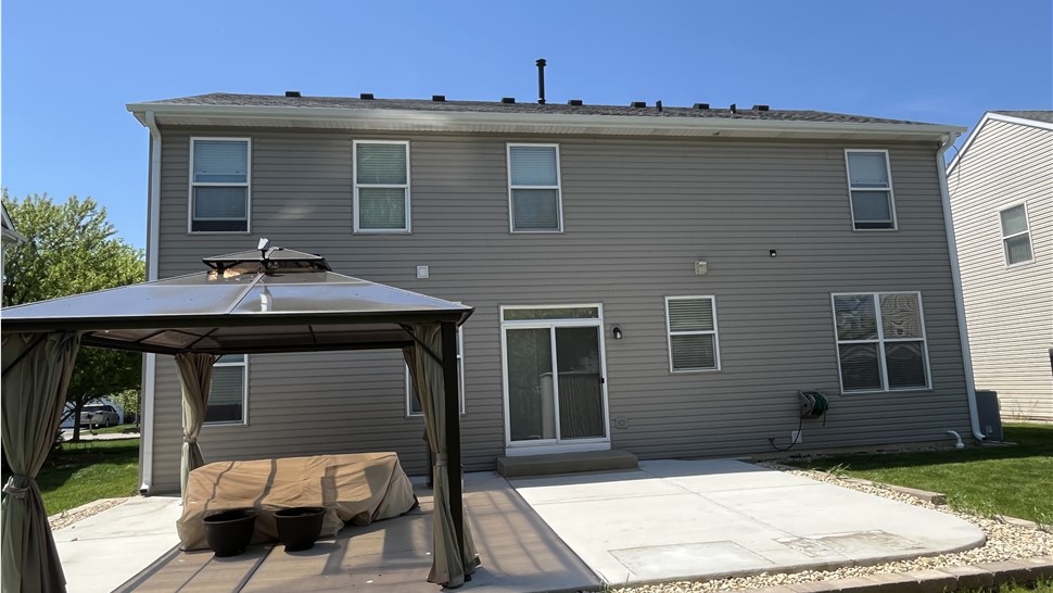 "Exemplary craftsmanship showcased by TTLC Roofing in Oswego, featuring the stunning Peppercorn by Owens Corning technique for long-lasting durability and captivating visual impact."