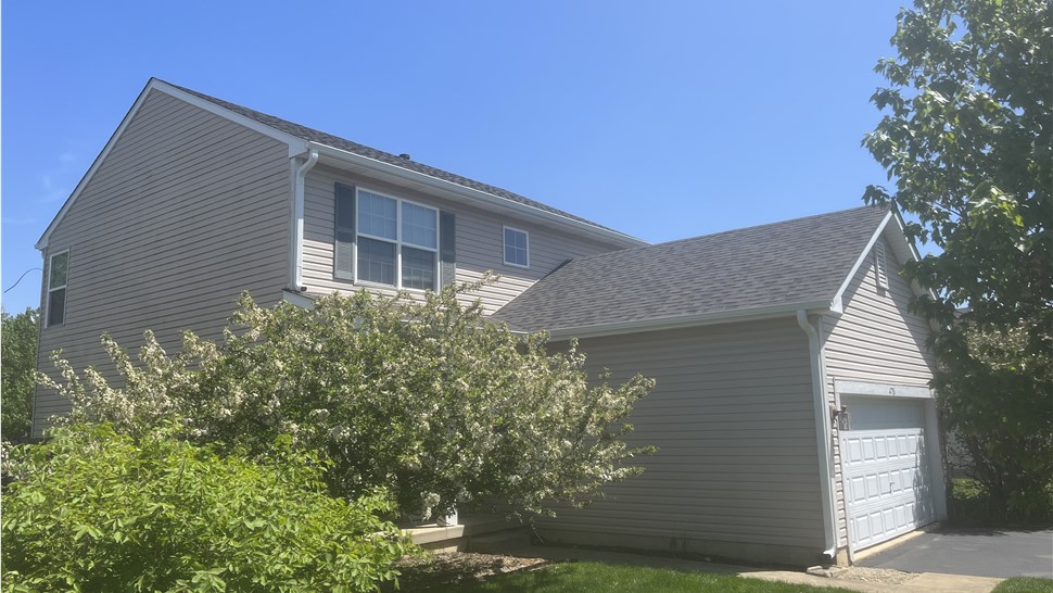 TTLC Roofing in Oswego showcases remarkable craftsmanship and durability with the stunning Peppercorn by Owens Corning technique