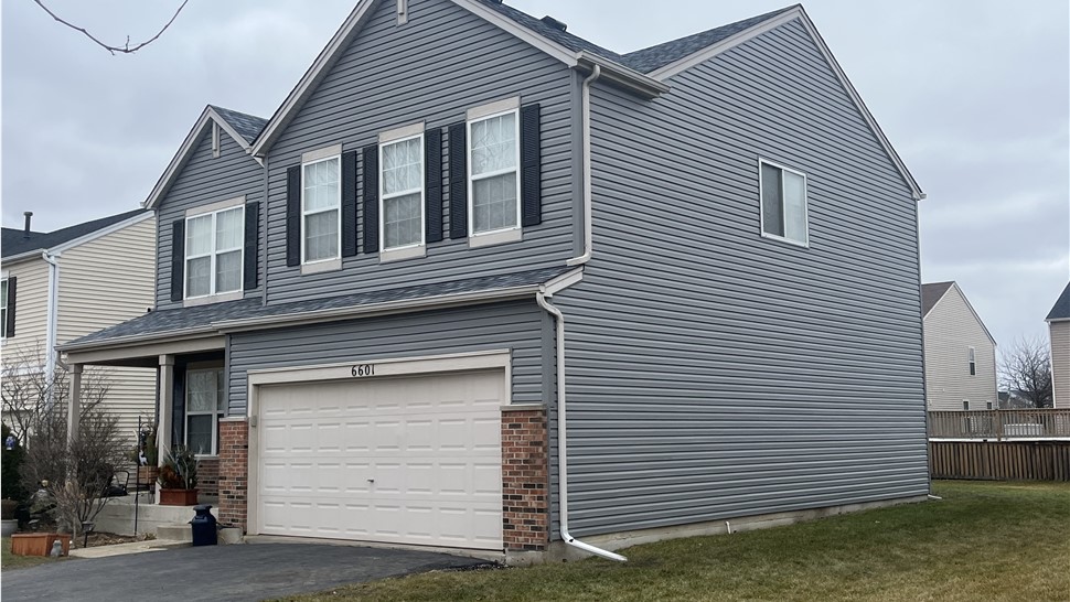 Woodale, Bloomingdale, Grayslake, Joliet, Plainfield, satisfied customer, seamless gutters, siding hail damage, siding repair, roofing repair, seamless gutter systems, affordable, wind damage.