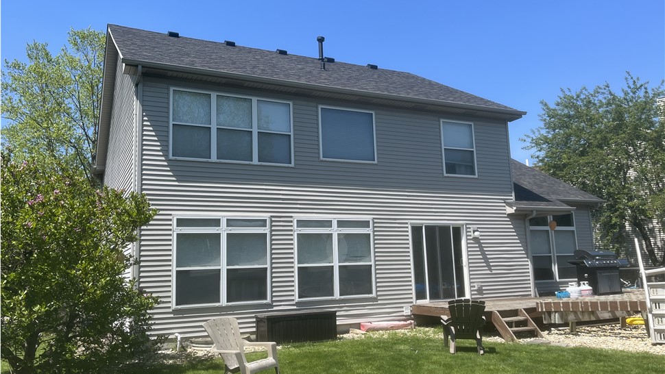 TTLC Roofing - Plainfield's Finest: Expertly Crafted Onyx Black Roofing, Showcasing Uncompromising Quality and Lasting Beauty.