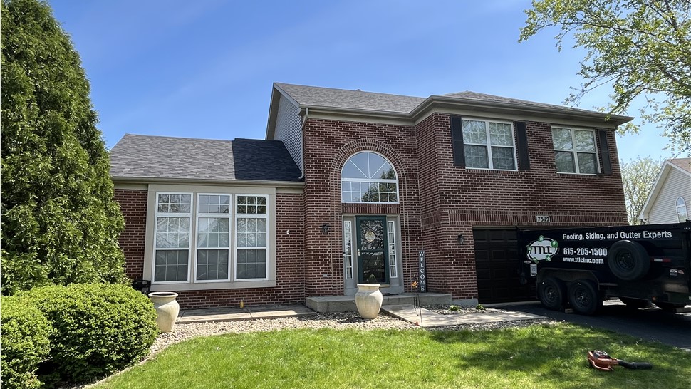 Transform Your Plainfield Roof with TTLC Roofing's Exquisite Onyx Black Installation, Showcasing Superior Craftsmanship and Lasting Quality.