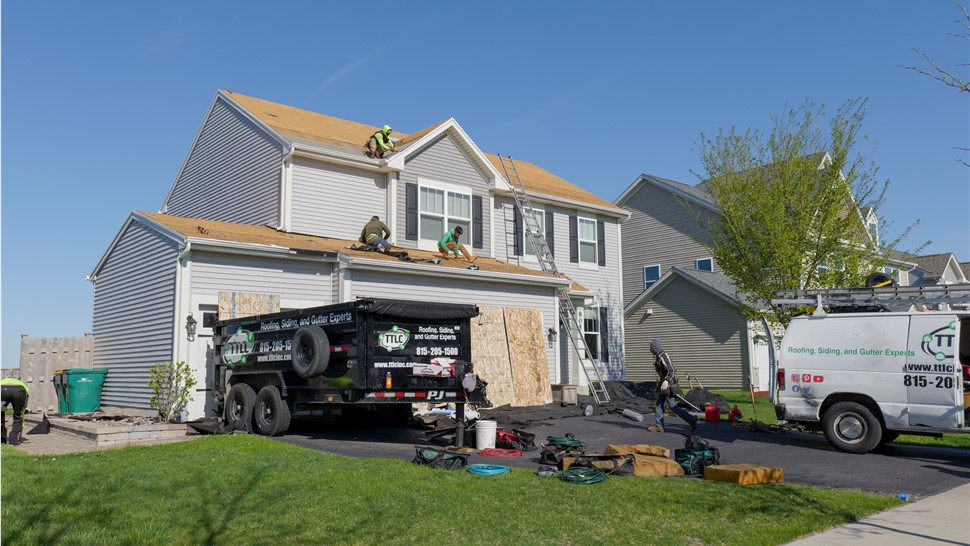 Roofing excellence exemplified - TTLC Roofing showcases a sturdy and professionally installed roof in Joliet