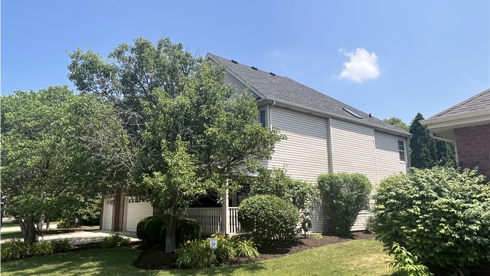 Impeccably Crafted Back House Roof: TTLC, Inc.'s Stunning Creation with Black Sable Shingles by Owens Corning in Shorewood, IL
