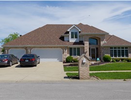 "Beautiful roof with Owens Corner Desert Rose Shingles by TTLC Inc. in Orland Park, IL."