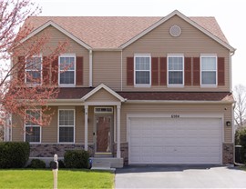 Gutters, Roofing, Storm Damage Project in Plainfield, IL by TTLC, Inc